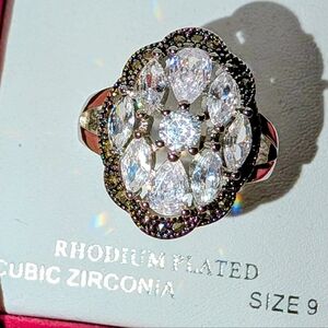 This is a Sparkle Allure Pure Silver Over Brass Flower Cluster Co